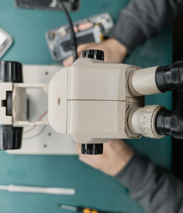 Modern electronic repair workshop with professional equipment and diagnostic tools