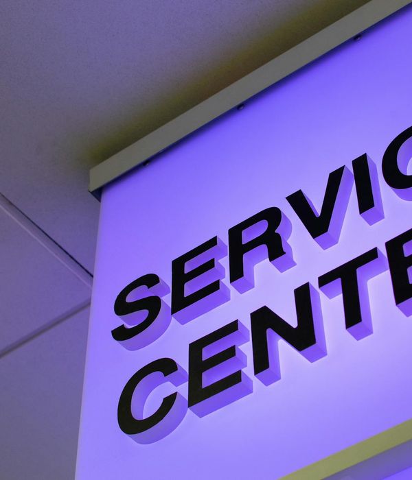 Modern repair service center storefront with welcoming entrance and professional signage