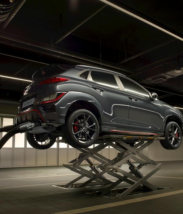 Modern repair workshop interior with professional equipment and workstations