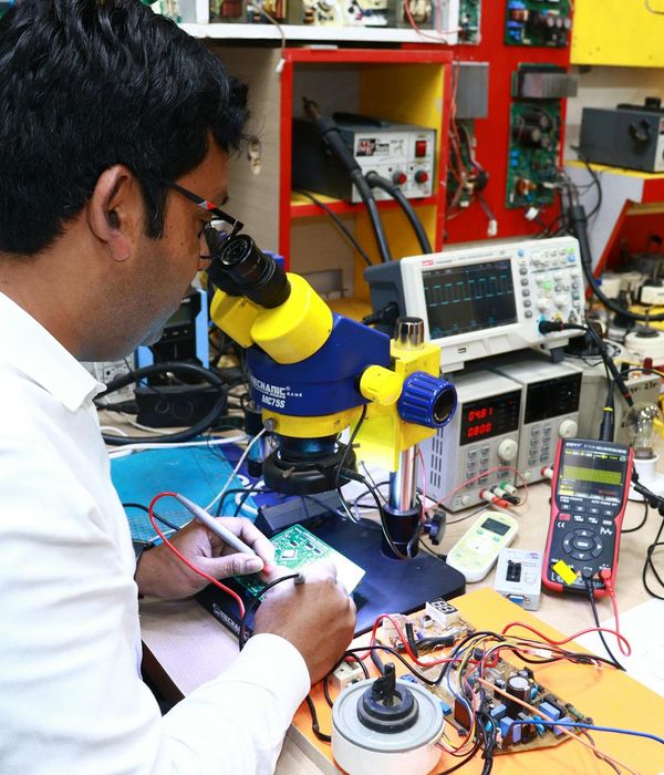 Professional technician conducting comprehensive device diagnostic test with specialized equipment